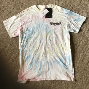Woman’s tie dyed “Woodstock” tee shirt, size small.  Brand is Junk Food Clothing
